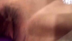 Big purple dildo stretching a tight wet pussy hard