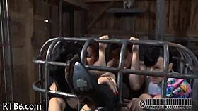 Restrained girl faces punishment in garage.