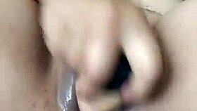 Pornstar Poosoo Uses New Dildo Under Falling Water