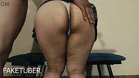 during the interview, she pulls up her skirt to show her buttocks