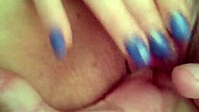 She's fingering her wet pussy during an intense masturbation session