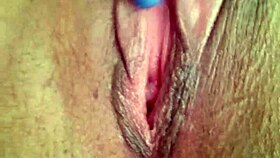 She's fingering her wet pussy during an intense masturbation session