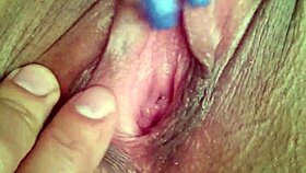 She's fingering her wet pussy during an intense masturbation session