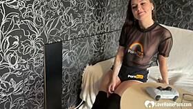 In this homemade video, the gamer girl kneels to handle a monster cock