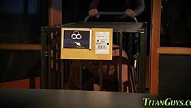 Watch me piss on this caged muscular guy!