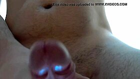 Man jerks off and shoots cum close up.