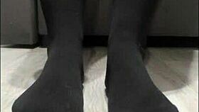 I tease my toy's legs in black leggings, feeling the anal thrill