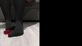 I tease my toy's legs in black leggings, feeling the anal thrill