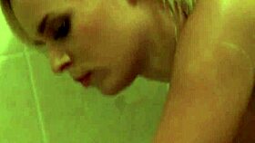 Solo blonde babe masturbates in shower