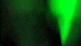 Morena performs strip-tease in dark room with clothes ripped