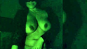 Morena performs strip-tease in dark room with clothes ripped