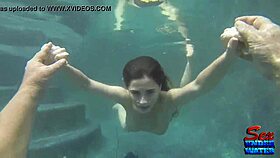 Molly Jane, the seductive mermaid, gets her clothes ripped in an underwater erotic scene.
