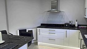 this little bikini man gets dominated by a huge tall giantess in a fetish scene.