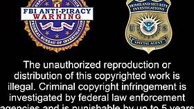 Giggles splashes her petite feet in the wet beach sand while sucking toes