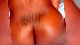 TAsteful ebony amateur being fondled with a big dildo to make her pussy wet and Creamed