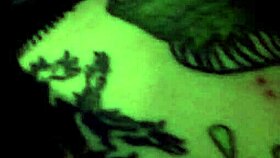 Goth milf in a cage with toys