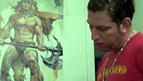 this redhead is playing with a monster cock in the bedroom.