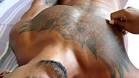 Black guy jerks off his cock in a casual blowjob scene