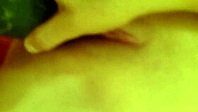 masturbating with a cucumber in private moment
