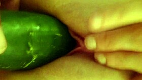 masturbating with a cucumber in private moment