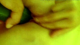 masturbating with a cucumber in private moment