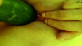 masturbating with a cucumber in private moment