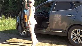 Lady Redrose strips naked in her bodystocking outdoors, showing off her ass.