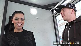 brunette with big tits performs titty fuck and footjob on the street in public fetish sex session