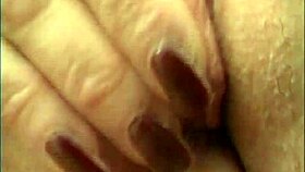 Milf gropes her hairy pussy