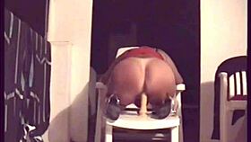 Mature woman intensely masturbates with toys on the terrace.