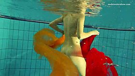 nastya strips down and shows her naked body in the pool