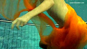 nastya strips down and shows her naked body in the pool