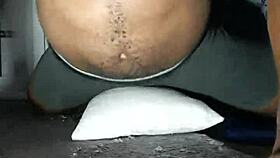 a muscular guy desperately humps his pillow, craving rough sex