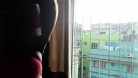 Indian Bhabi Teases with Hot Strip