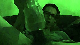 Intense gay play with toy in bold action.