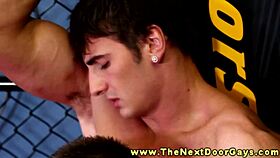 The muscular gay amateur eagerly gives head to his partner in this intense scene.