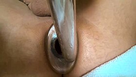 Check out this close-up anal tunnel with vibrator and dildo for intense masturbation