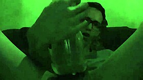 Intense gay play with toy in bold action.