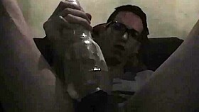 Intense gay play with toy in bold action.