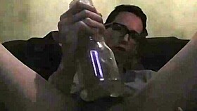 Intense gay play with toy in bold action.