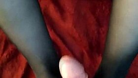 In this homemade video, a couple tries a footjob in stockings for the first time.