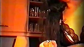 Alicia enjoys a banana in the kitchen while masturbating as a housewife