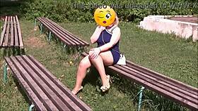 Blonde milf flashes upskirt in the park