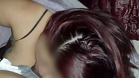 Watching movies with my neighbor while sucking his dick