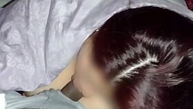 Watching movies with my neighbor while sucking his dick