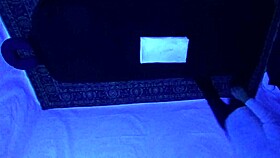 Gigi Breeze's Blacklight Massage Session