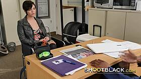 Director grabs chick's head while she deep throats on his cock