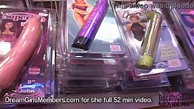 picking out a toy in a porn store, totally naked, this chunky blonde teen just owns it.