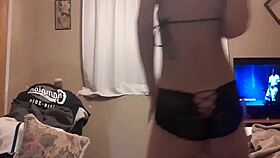 madison west performs a seductive strip tease, fingering her ass and masturbating