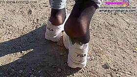 Girl Plays With Sweaty Fila Sneakers And Wet Nylons